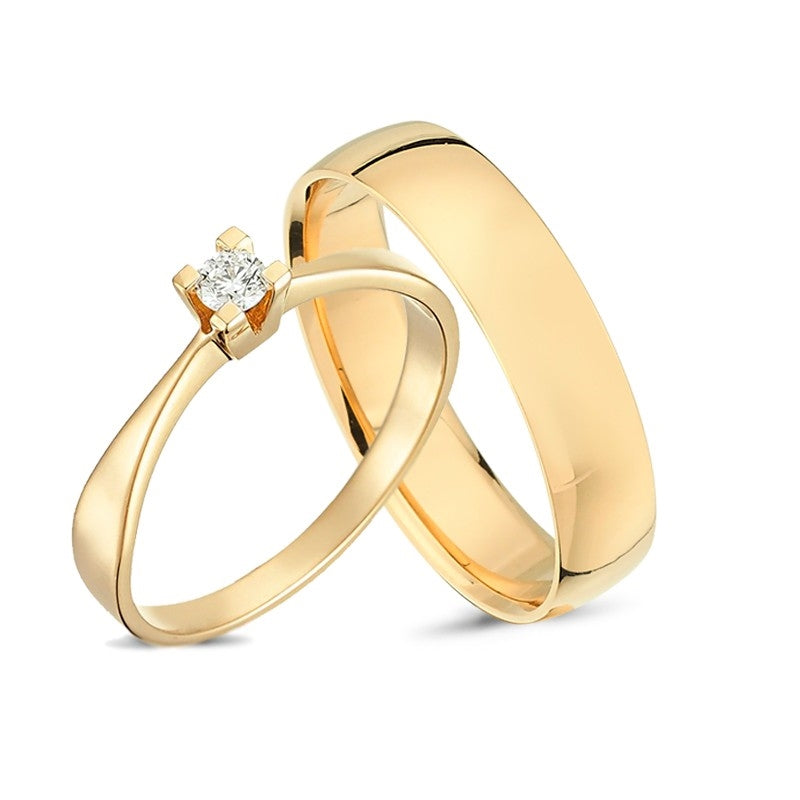 Unikke Nuran vielsesringe i 14 karat guld med 0,10 ct diamant – klassisk damering og rund herre ring.